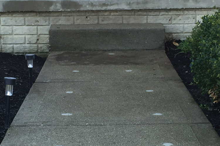 Uneven front walkway after concrete leveling